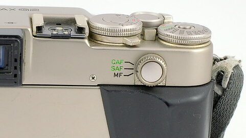 The Focus Mode Dial Next to the Viewfinder on the Rear of the Contax G2
