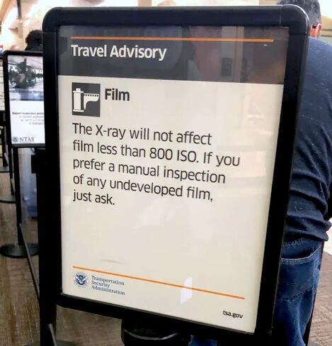 Airport Security Checkpoint Signing Warning about Photographic Film