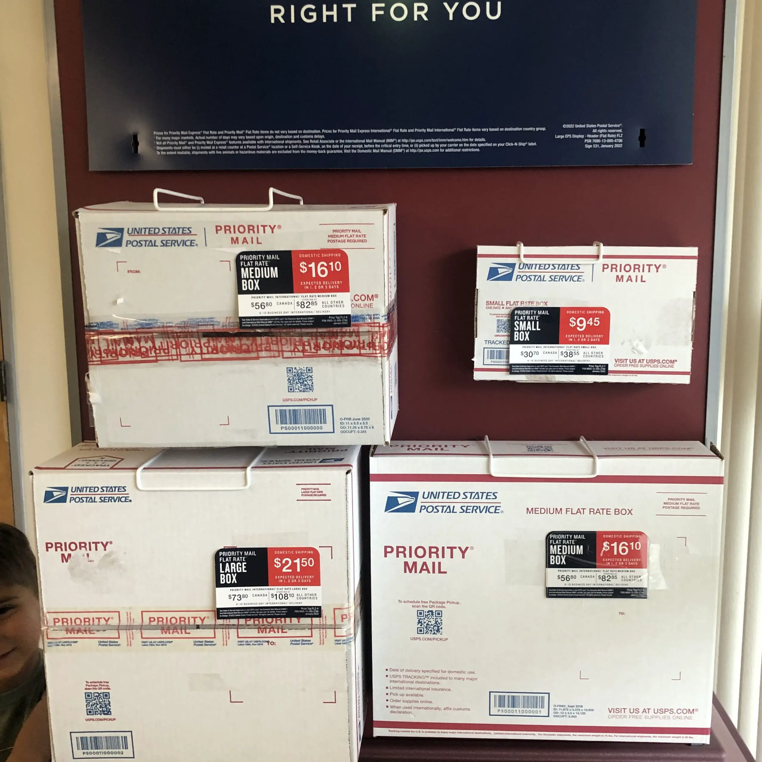 All the different Priority Flat Rate options (minus the flat rate envelope) available at the USPS post office with their price. 