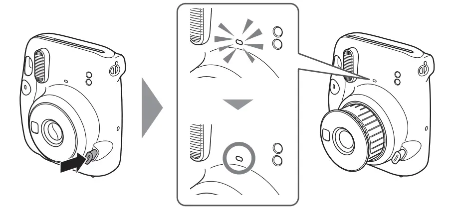 The lit on the front of the Instax Mini 11 will slowly blink when the camera is turned on to indicate the flash is charging.