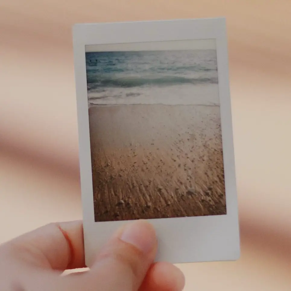 In this picture of an Instax Mini image, the beach is slightly out of focus compared to the rest of the scene